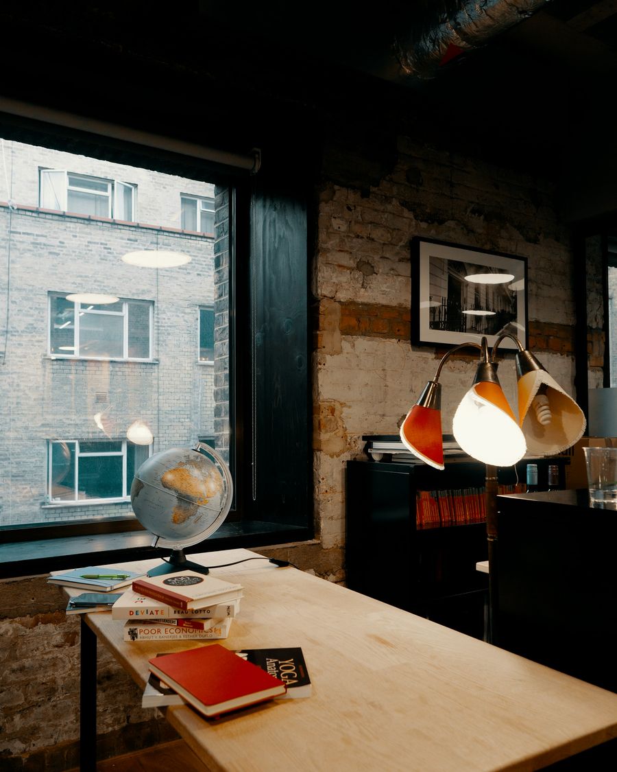 A Hamilton & Chase travel designer reviewing an itinerary at a desk